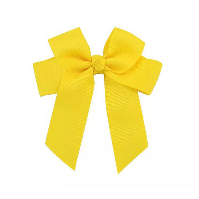 Girl's sunny yellow ribbon bow hair clip.