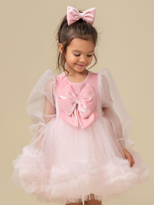 Girl modelling the Caramelo tulle party dress.