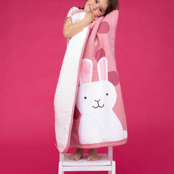 Girl holding the Cosatto Bunny Buddy Sherpa Blanket - 0183