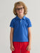 Baby boy wearing the GANT sunfaded polo shirt.