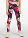 Girl modelling the Guess floral print leggings.