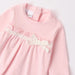 iDo pink babygrow with white lace trim.