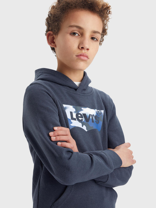 Boy modelling the Levi's batwing hoodie.