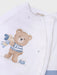 Newborn babygrow with charming teddy bear print. 