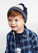 Baby boy wearing the Mayoral Bobble Hat Dark.