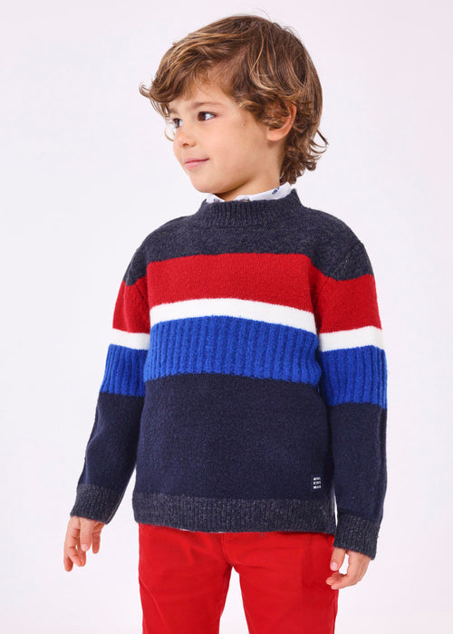 Boy modelling the Mayoral colourblock sweater.