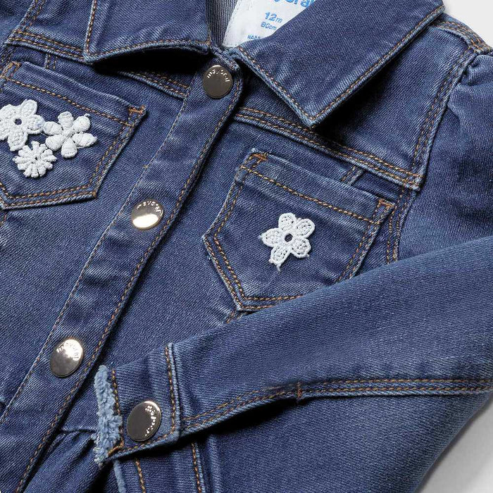 Baby girl's denim jacket with white flower embroidery.