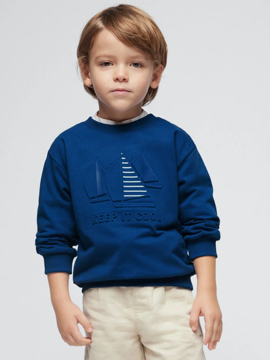 Boy wearing the Mayoral embossed pullover.
