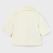 Rear view of the Mayoral faux fur coat.