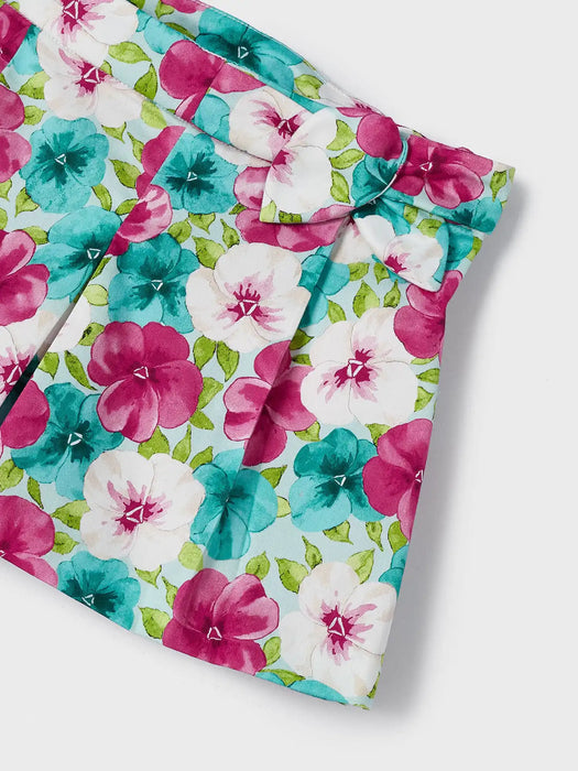 Mayoral shorts with turquoise, white, and pink floral print.