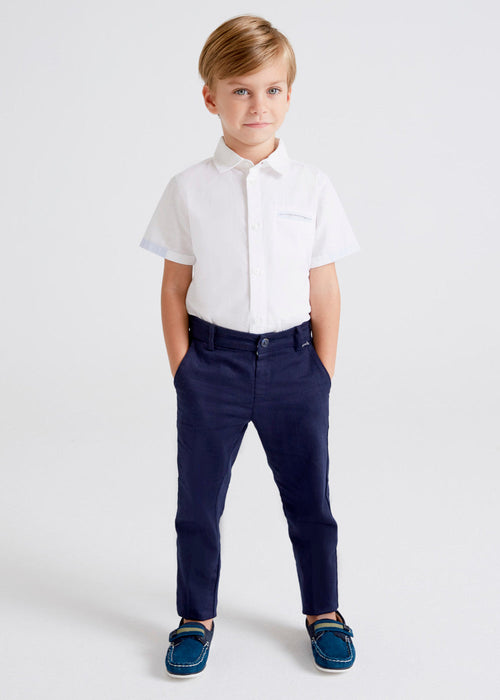Boy modelling the Mayoral Formal Trousers