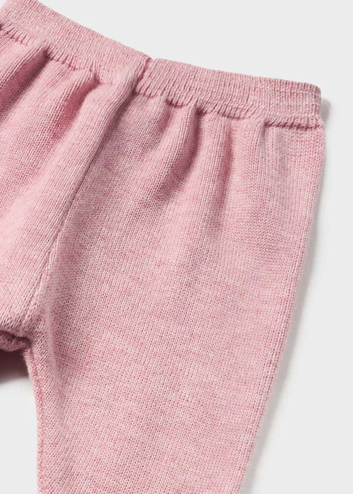 Baby girl's pink knitted bottoms.