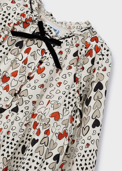 Closer view of the Mayoral heart print dress.
