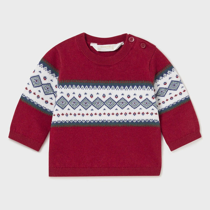 Newborn boy's red knitted jumper.