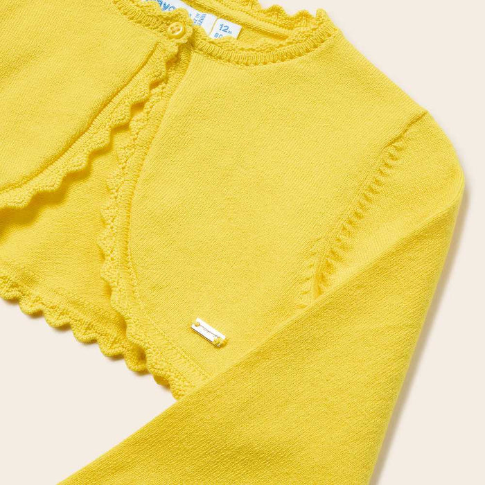 Closer look at the Mayoral bright yellow knitted shrug.