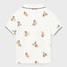 Reverse side of the Mayoral cream monkey print polo shirt.