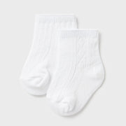 Closer view of the Mayoral patterned socks.