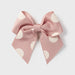 Mayoral blush pink polka dot bow clip.