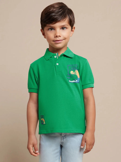 Boy wearing the Mayoral polo shirt.
