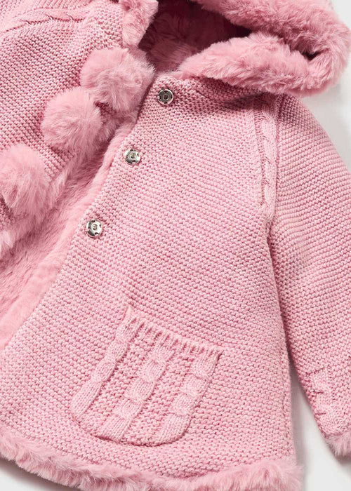Closer look at the Mayoral pink pom pom cardigan.