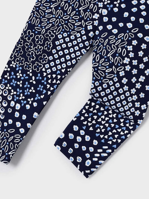 Mayoral navy leggings with abstract pattern of hearts and flowers.