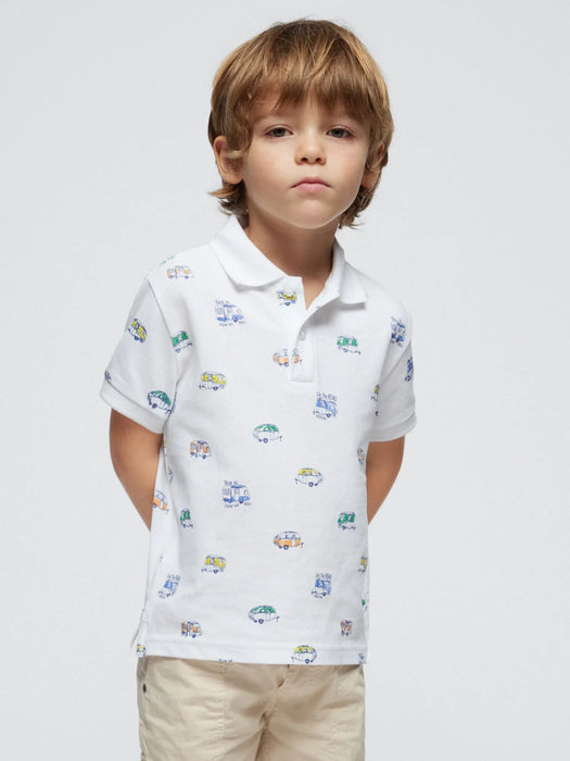 Boy wearing the Mayoral printed polo shirt.