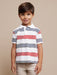 Boy wearing the Mayoral striped polo shirt.