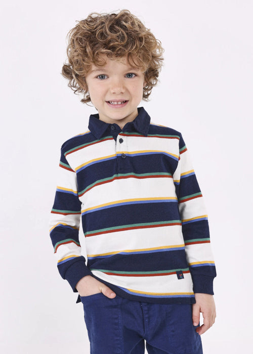 Boy modelling the Mayoral striped polo shirt.