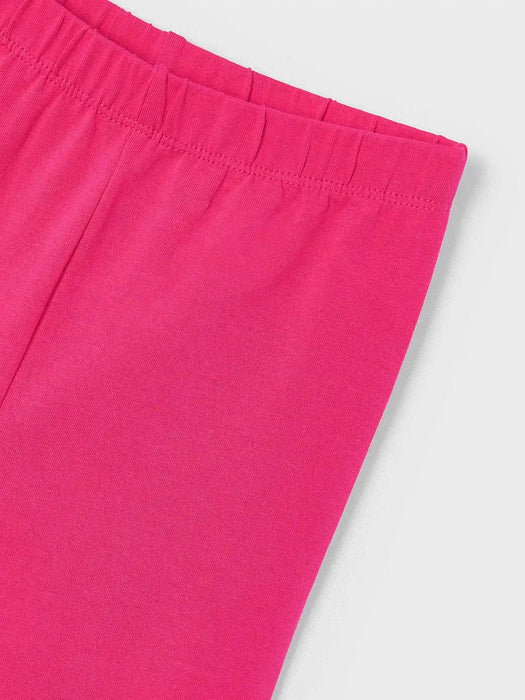 Closer view of the magenta pink leggings.
