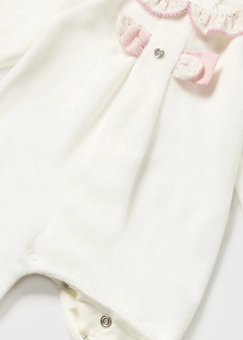 Closer look at the Mayoral white velour babygrow.