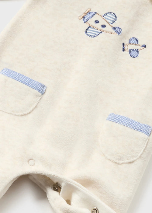 Closer look at the Mayoral cream velour babygrow.