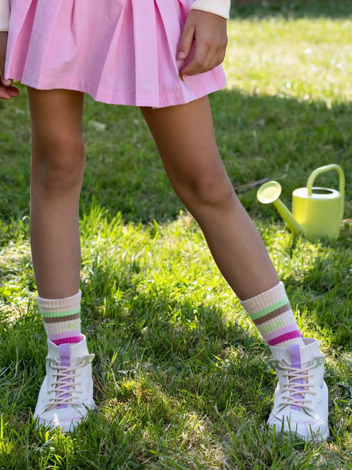 Girl wearing the NoNo roma socks.