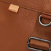 Close up view of the faux leather finish on the Pacapod Saunton Changing Bag - Tan