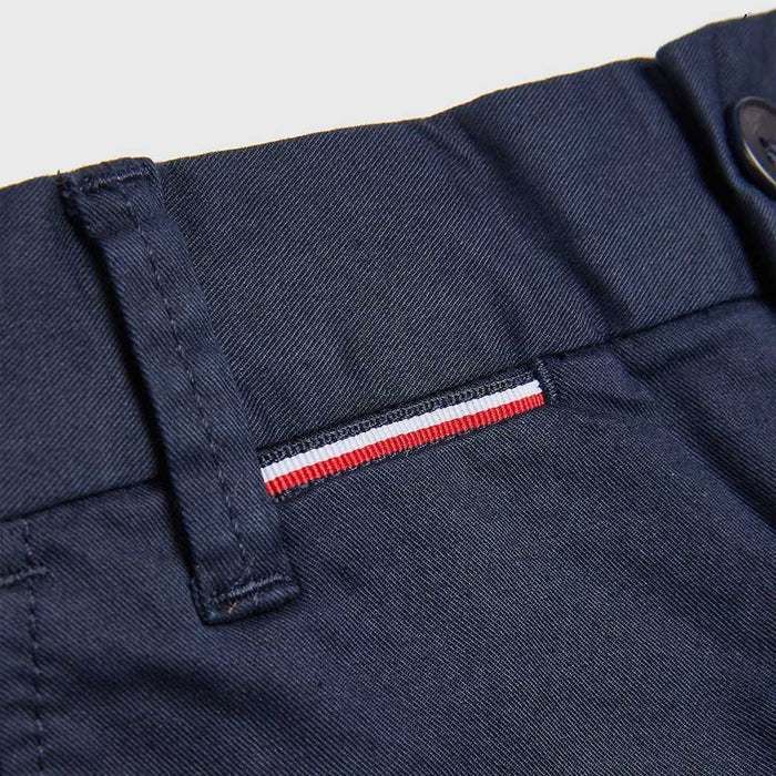 Tommy Hilfiger 1985 chinos with flag branding along the waistband.