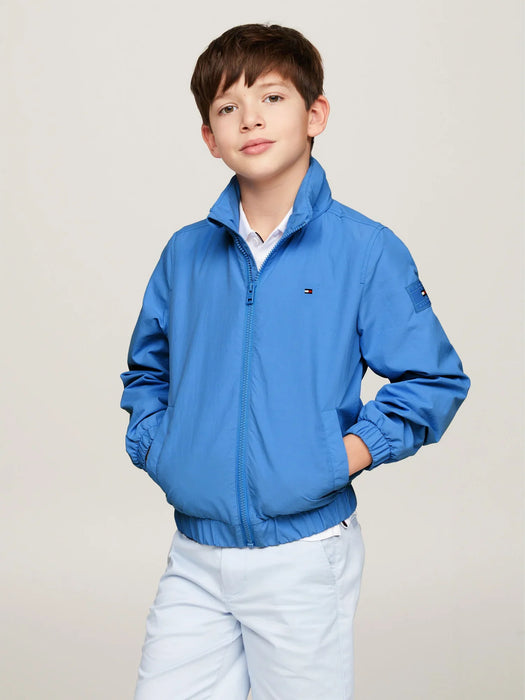 Boy wearing the Tommy Hilfiger essential jacket.