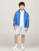 Boy modelling the Tommy Hilfiger essential jacket.