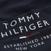 Tommy Hilfiger track bottoms with NYC logo branding.