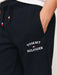 Closer look at the Tommy Hilfiger logo track bottoms.