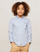 Boy wearing the Tommy Hilfiger mini print shirt.