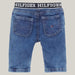 Back view of the Tommy Hilfiger blue monotype jeans.