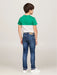 Boy wearing the Tommy Hilfiger scanton stretch jeans.