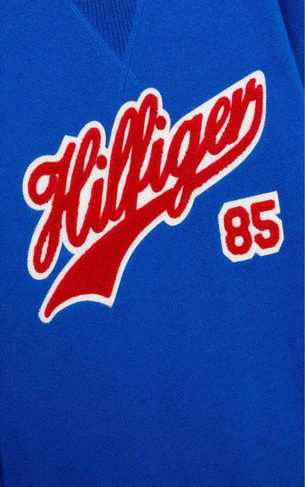 Closer view of the Tommy Hilfiger script logo sweatshirt.