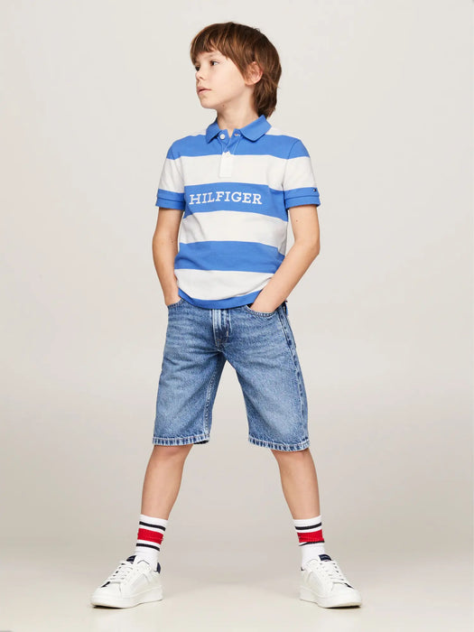 Boy wearing the Tommy Hilfiger striped polo shirt.
