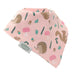 Ziggle pink bandana bib printed with hedgehogs, squirrels, and forest plants.